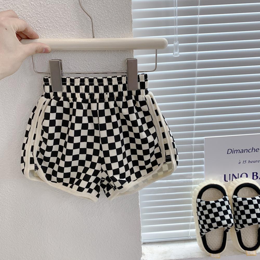y033 - Korean children's clothing boys summer sports suit children's solid color tops shorts girls foreign style fashionable two-piece suit - Image 4