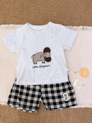 Light heather grey raglan short-sleeved top with shoulder snaps, an elephant graphic and Hello Elephant lettering, paired with black, grey and white checked shorts.